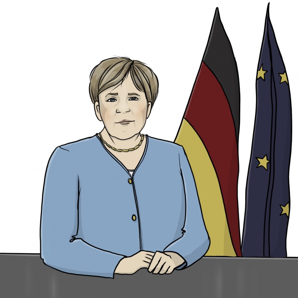 Angela Merkel sitzt vor einer deutschen und einer europäischen Flagge.